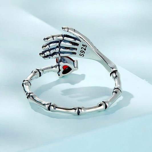 “Crimson Grip” S925 Sterling Silver Open Adjustable Skull Hand Heart Ring