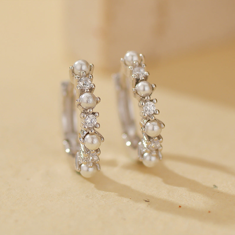 “Pearl Halo Gleam” S925 Sterling Silver Pearl Huggie Hoop Earrings with Zircon Accents