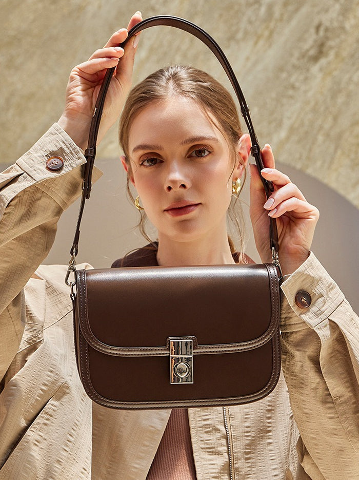 Women's Plain Cowhide Curved Satchel with Twist-Lock Closure