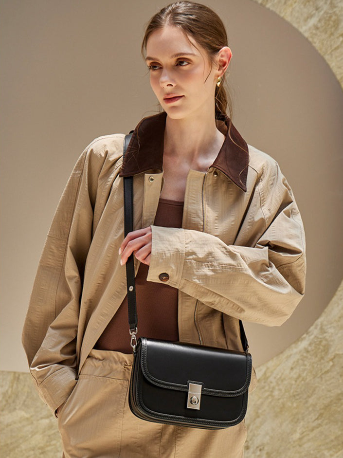 Women's Plain Cowhide Curved Satchel with Twist-Lock Closure