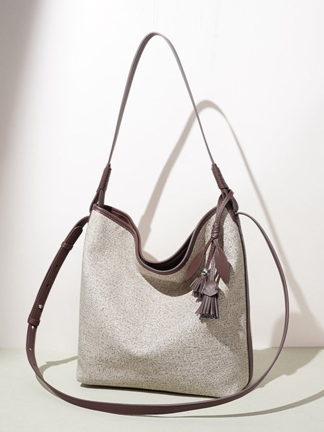 Women's Canvas Bucket Bag with Leather Trim and Tassel Charm