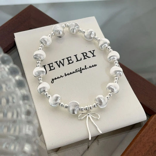 Cat’s Eye Bead Bracelet – 925 Sterling Silver Bowknot Charm, Elastic Fit, Gift Ready