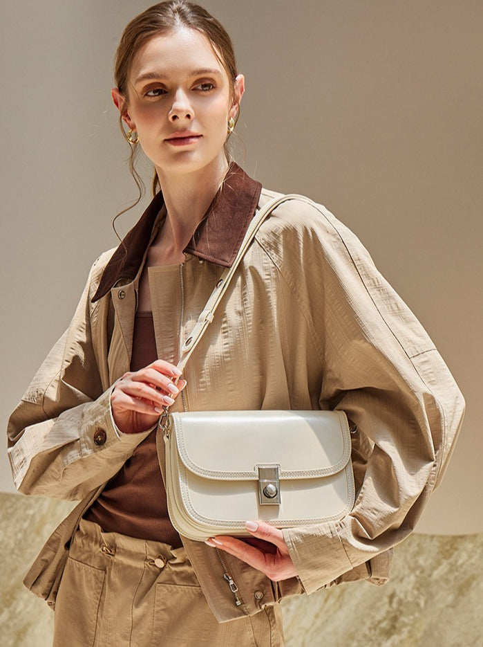 Women's Plain Cowhide Curved Satchel with Twist-Lock Closure