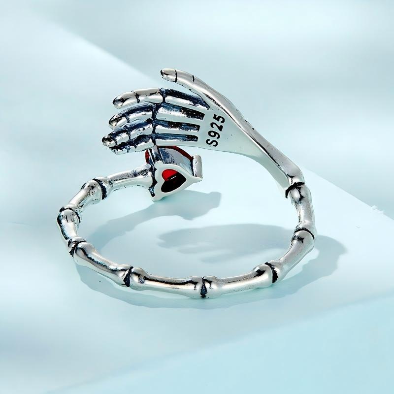 “Crimson Grip” S925 Sterling Silver Open Adjustable Skull Hand Heart Ring