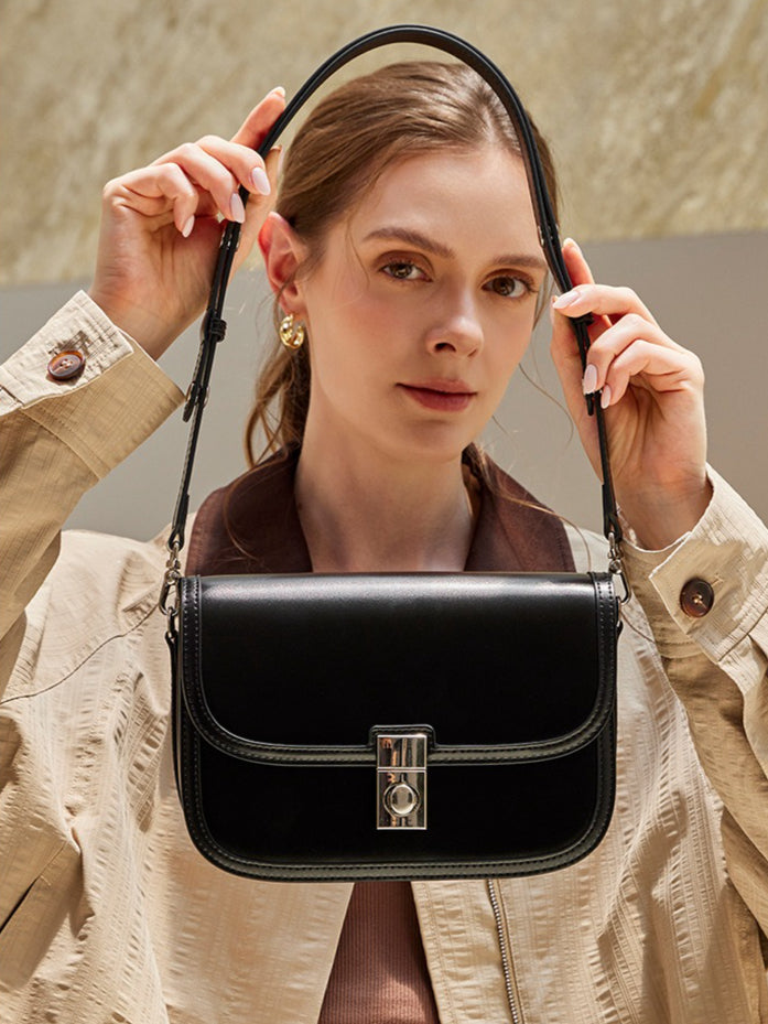 Women's Plain Cowhide Curved Satchel with Twist-Lock Closure