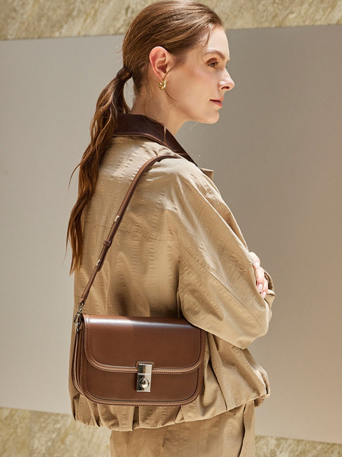 Women's Plain Cowhide Curved Satchel with Twist-Lock Closure