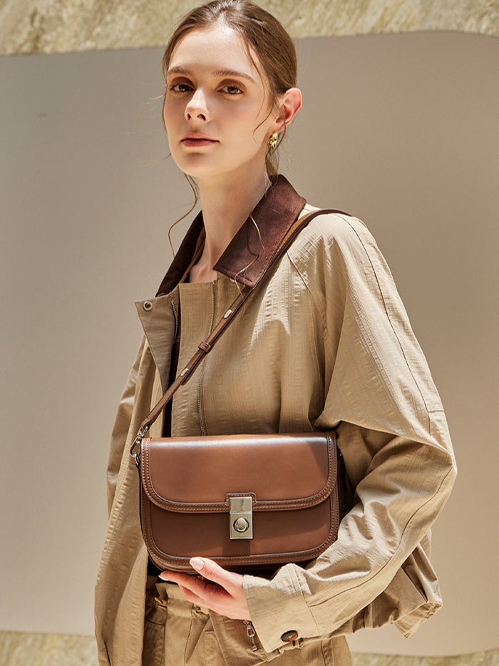 Women's Plain Cowhide Curved Satchel with Twist-Lock Closure