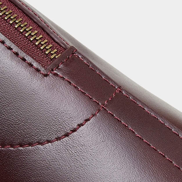Women's Genuine Leather Dome Satchel with Tassel Detail