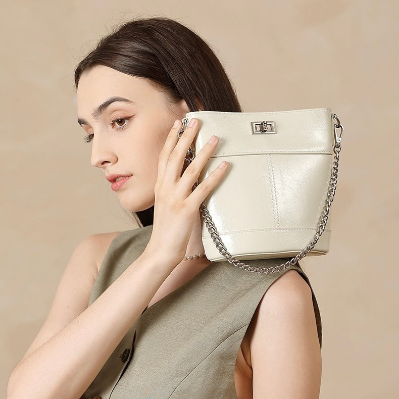 Women's Genuine Leather Waxed Bucket Bag with Lock Detail
