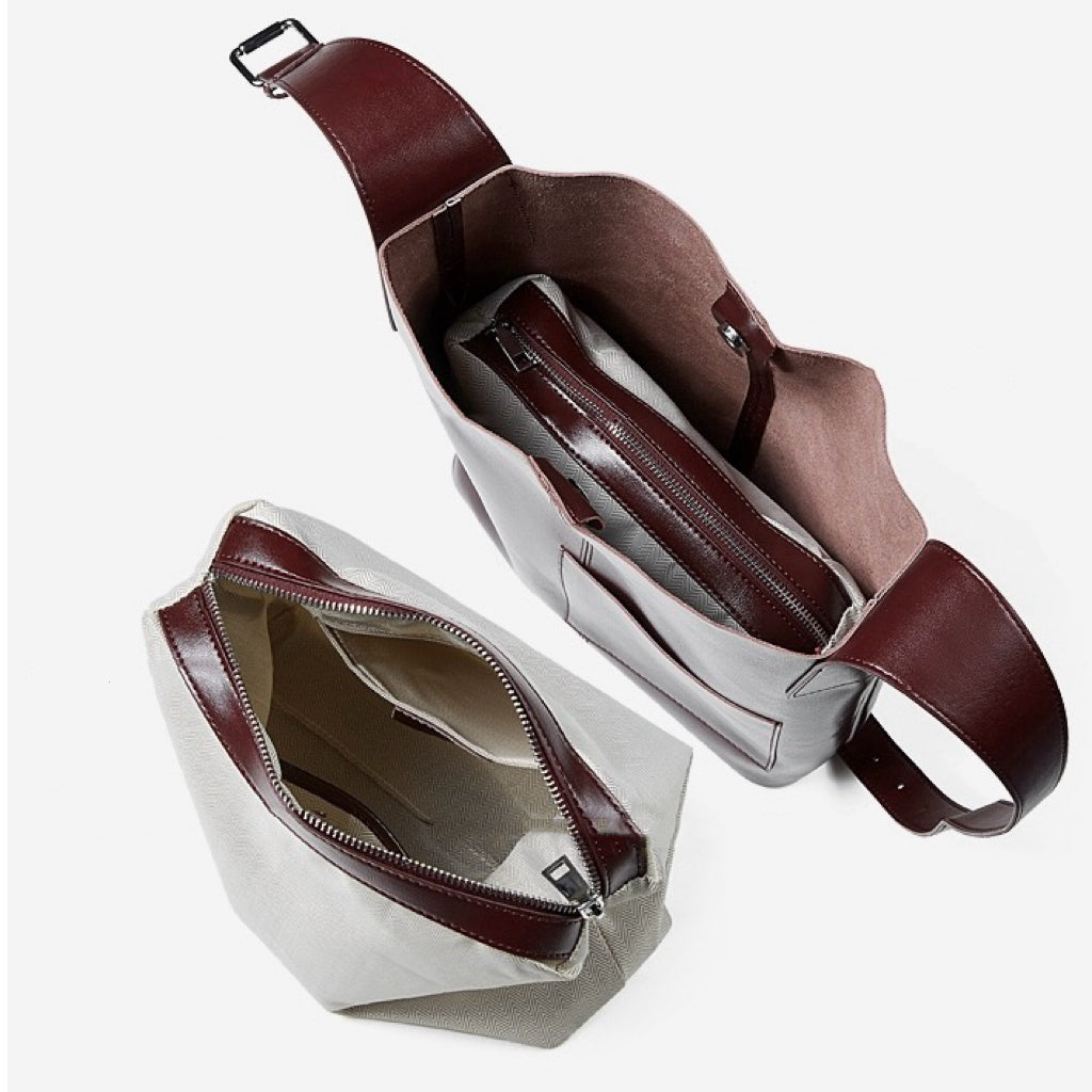 Leather Hobo Bag ¨C Minimalist Silhouette with Signature Pocket Detail