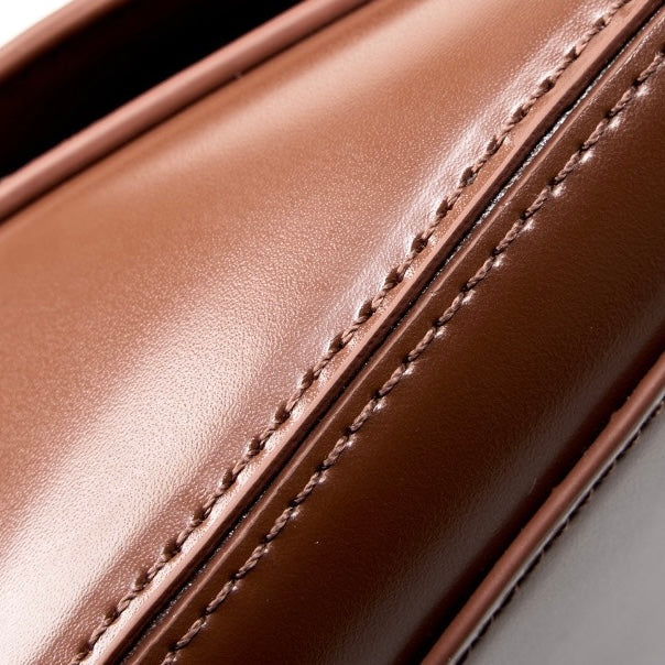 Women's Genuine Leather Saddle Crossbody Bag with Magnetic Closure