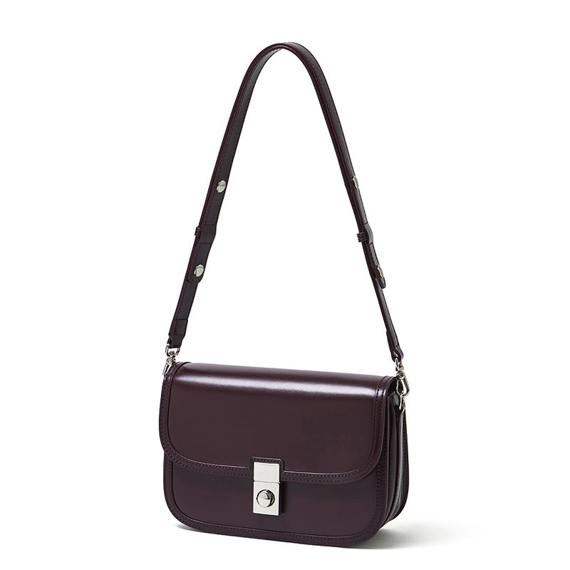 Women's Plain Cowhide Curved Satchel with Twist-Lock Closure
