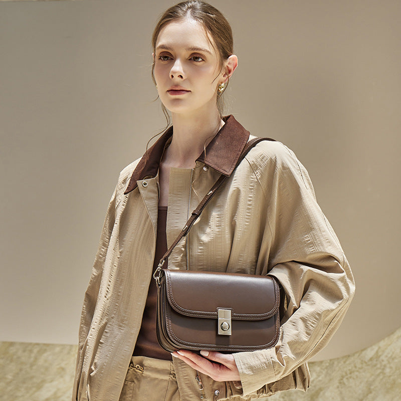 Women's Plain Cowhide Curved Satchel with Twist-Lock Closure