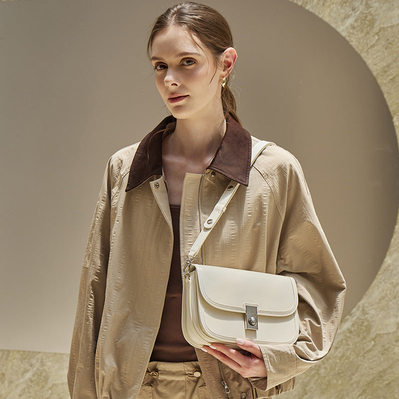 Women's Plain Cowhide Curved Satchel with Twist-Lock Closure