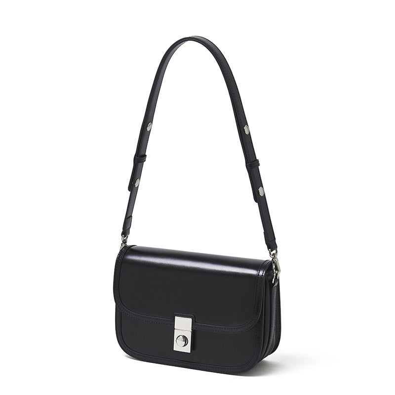 Women's Plain Cowhide Curved Satchel with Twist-Lock Closure