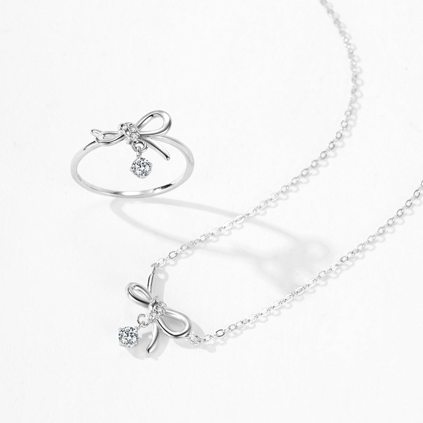 Lumi Bow Bow Necklace & Ring Set in 925 Sterling Silver