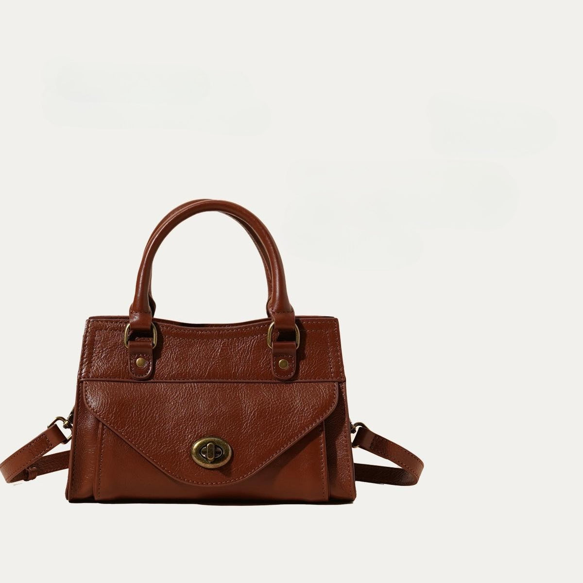 Women's Oil-Waxed Cowhide Turnlock Mini Top Handle Bag