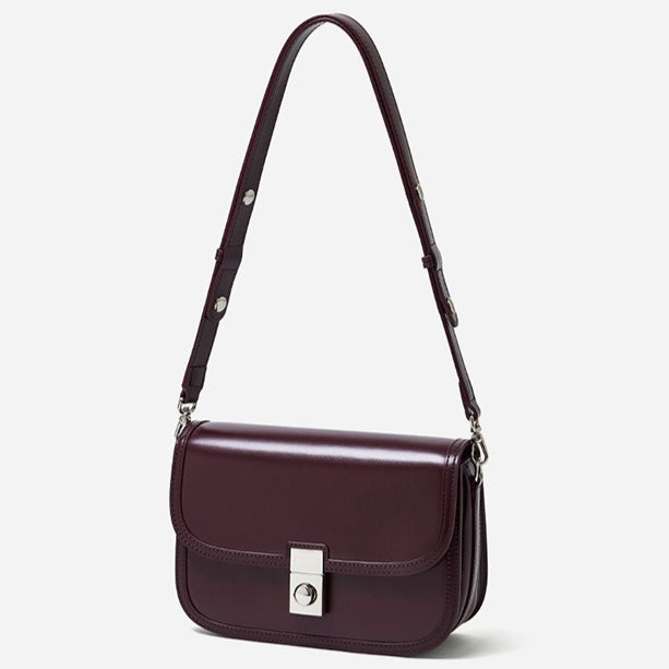 Women's Plain Cowhide Curved Satchel with Twist-Lock Closure