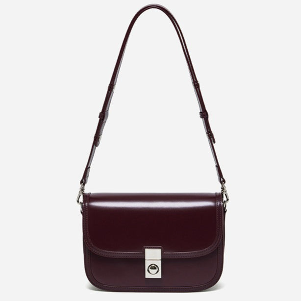 Women's Plain Cowhide Curved Satchel with Twist-Lock Closure