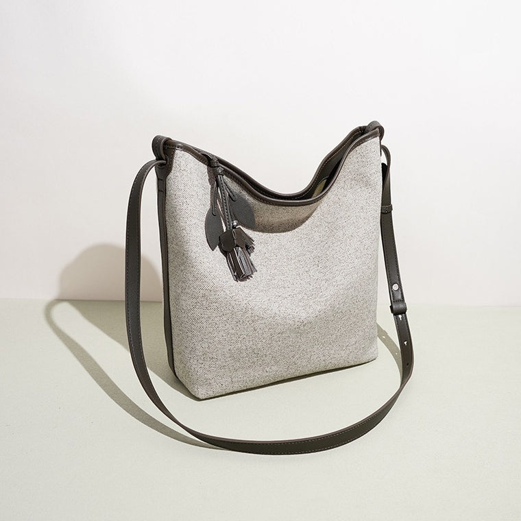 Women's Canvas Bucket Bag with Leather Trim and Tassel Charm
