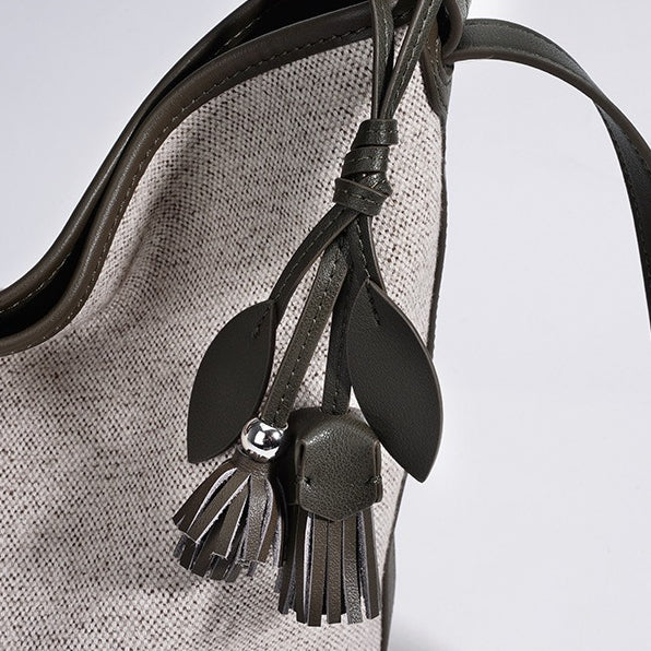 Women's Canvas Bucket Bag with Leather Trim and Tassel Charm