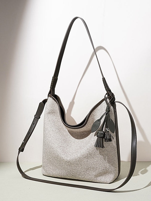 Women's Canvas Bucket Bag with Leather Trim and Tassel Charm