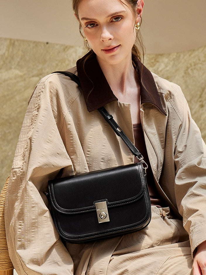 Women's Plain Cowhide Curved Satchel with Twist-Lock Closure